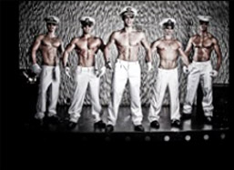 Male strippers on stage at the strip club